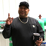 Jarrod Cameron standing in the Long Plain First Nation water treatment plant.